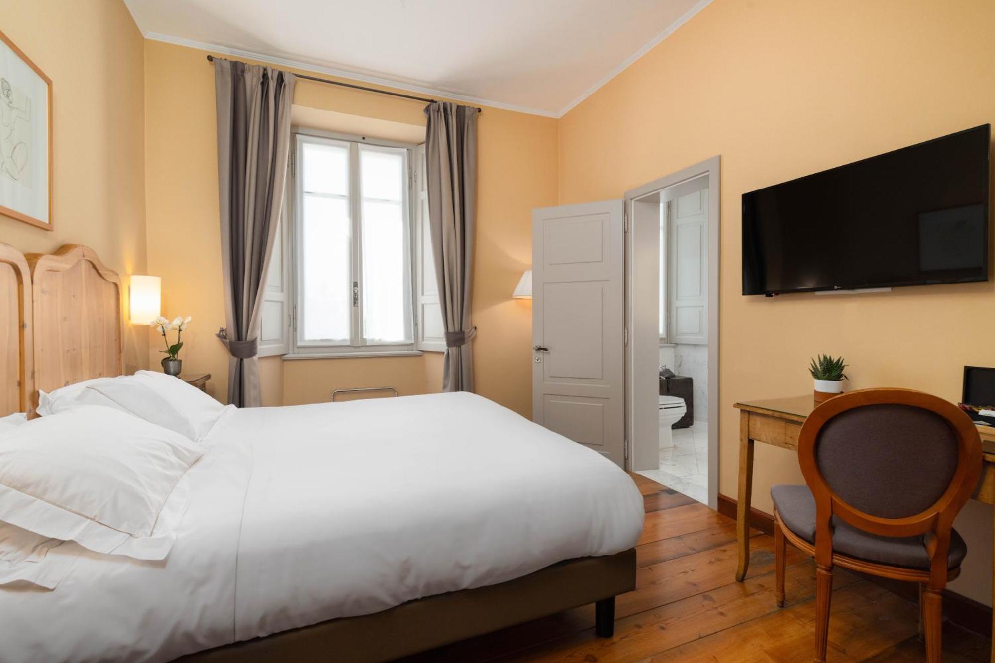 Qc Terme Grand Hotel Bagni Nuovi Bormio Exterior foto A room at the hotel