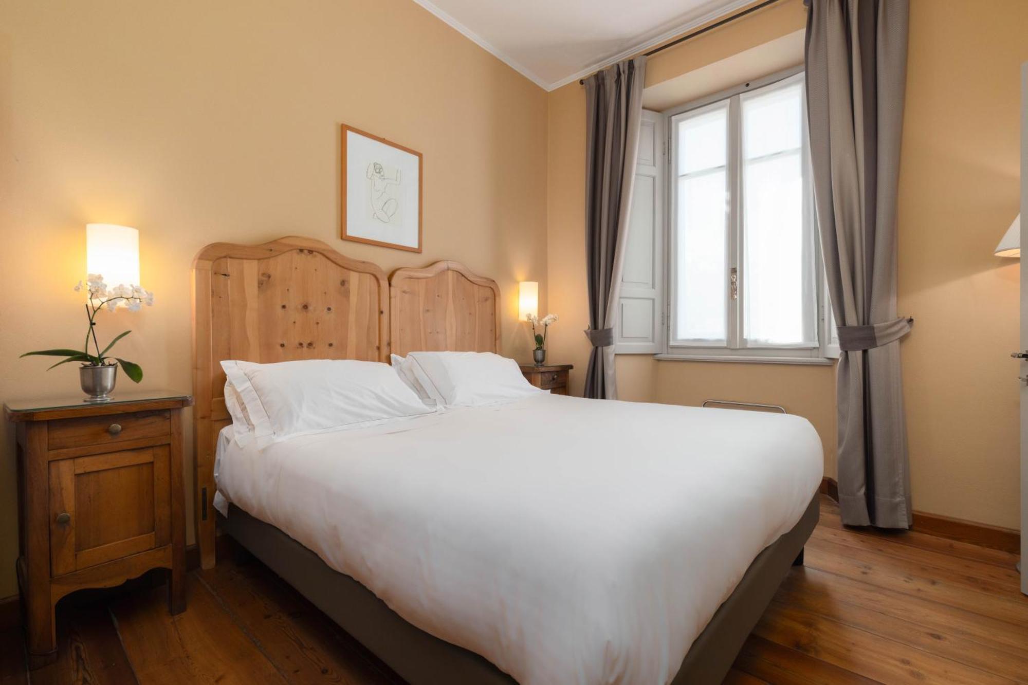 Qc Terme Grand Hotel Bagni Nuovi Bormio Exterior foto A bedroom at the hotel