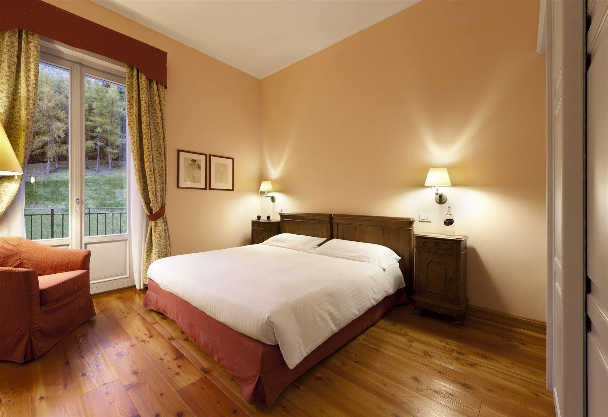 Qc Terme Grand Hotel Bagni Nuovi Bormio Exterior foto A room at the hotel
